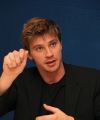 54648964_garrett_hedlund_country_strong_press_conference_portraits_by_herve_tropea_24.jpg